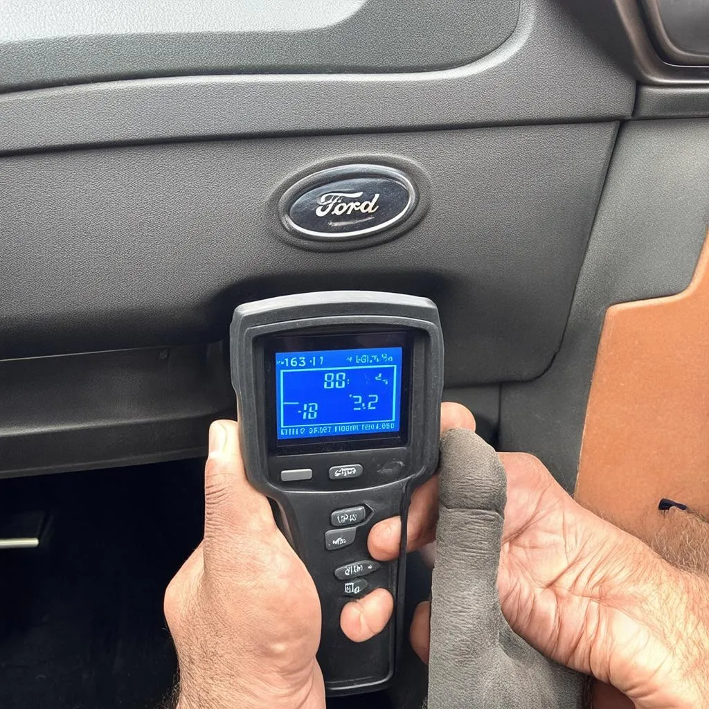 OBD-I scanner in use